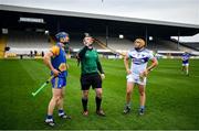 7 November 2020; Referee Thomas Walsh performs the coin toss in the company of team captains David McInerney, left, and Enda Rowland of Laois prior to the GAA Hurling All-Ireland Senior Championship Qualifier Round 1 match between Clare and Laois at UPMC Nowlan Park in Kilkenny. Photo by Brendan Moran/Sportsfile
