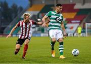 7 November 2020; Aaron Greene of Shamrock Rovers in action against Conor McCormack of Derry City during the SSE Airtricity League Premier Division match between Shamrock Rovers and Derry City at Tallaght Stadium in Dublin. Photo by Seb Daly/Sportsfile