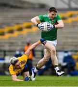 8 November 2020; Patrick Durcan of Mayo breaks the tackle by Cathal Compton of Roscommon during the Connacht GAA Football Senior Championship Semi-Final match between Roscommon and Mayo at Dr Hyde Park in Roscommon. Photo by Ramsey Cardy/Sportsfile