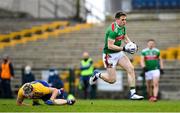 8 November 2020; Patrick Durcan of Mayo breaks the tackle by Cathal Compton of Roscommon during the Connacht GAA Football Senior Championship Semi-Final match between Roscommon and Mayo at Dr Hyde Park in Roscommon. Photo by Ramsey Cardy/Sportsfile