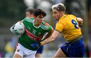 8 November 2020; Tommy Conroy of Mayo is tackled by Cathal Compton of Roscommon during the Connacht GAA Football Senior Championship Semi-Final match between Roscommon and Mayo at Dr Hyde Park in Roscommon. Photo by Ramsey Cardy/Sportsfile