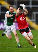 8 November 2020; Daniel McGuinness of Down in action against Aidan Breen of Fermanagh during the Ulster GAA Football Senior Championship Quarter-Final match between Fermanagh and Down at Brewster Park in Enniskillen, Fermanagh. Photo by Sam Barnes/Sportsfile