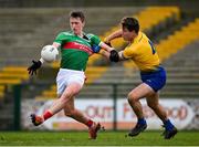 8 November 2020; Cillian O'Connor of Mayo in action against Seán Mullooly of Roscommon during the Connacht GAA Football Senior Championship Semi-Final match between Roscommon and Mayo at Dr Hyde Park in Roscommon. Photo by Ramsey Cardy/Sportsfile