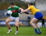8 November 2020; Lee Keegan of Mayo in action against Cathal Cregg of Roscommon during the Connacht GAA Football Senior Championship Semi-Final match between Roscommon and Mayo at Dr Hyde Park in Roscommon. Photo by Ramsey Cardy/Sportsfile