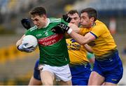 8 November 2020; Patrick Durcan of Mayo is tackled by Cathal Cregg of Roscommon during the Connacht GAA Football Senior Championship Semi-Final match between Roscommon and Mayo at Dr Hyde Park in Roscommon. Photo by Ramsey Cardy/Sportsfile