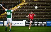 8 November 2020; Donal O'Hare of Down scores a free watched by Declan McCusker of Fermanagh during the Ulster GAA Football Senior Championship Quarter-Final match between Fermanagh and Down at Brewster Park in Enniskillen, Fermanagh. Photo by Sam Barnes/Sportsfile