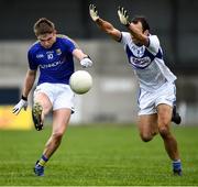 8 November 2020; Dessie Reynolds of Longford is tackled by Gareth Dillon of Laois during the Leinster GAA Football Senior Championship Quarter-Final match between Longford and Laois at Glennon Brothers Pearse Park in Longford. Photo by Ray McManus/Sportsfile