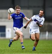 8 November 2020; Dessie Reynolds of Longford is tackled by Gareth Dillon of Laois during the Leinster GAA Football Senior Championship Quarter-Final match between Longford and Laois at Glennon Brothers Pearse Park in Longford. Photo by Ray McManus/Sportsfile