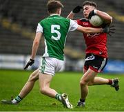 8 November 2020; Ceilium Doherty of Down in action against Josh Largo Ellis of Fermanagh during the Ulster GAA Football Senior Championship Quarter-Final match between Fermanagh and Down at Brewster Park in Enniskillen, Fermanagh. Photo by Sam Barnes/Sportsfile