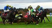 8 November 2020; Pike County, centre, with Mark Walsh up, falls at the last, alongside eventual winner Youngnedofthehill, left, with Conor McNamara up, during the Ladbrokes Best Odds Guaranteed Handicap Hurdle at Navan Racecourse in Meath. Photo by Seb Daly/Sportsfile