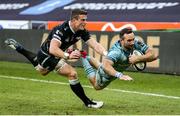 8 November 2020; Dave Kearney of Leinster dives over to score his side's second try despite the tackle of Scott Williams of Ospreys during the Guinness PRO14 match between Ospreys and Leinster at Liberty Stadium in Swansea, Wales. Photo by Chris Fairweather/Sportsfile