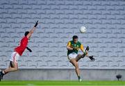 8 November 2020; David Clifford of Kerry kicks a point despite the efforts of Maurice Shanley of Cork in front of empty stands during the Munster GAA Football Senior Championship Semi-Final match between Cork and Kerry at Páirc Uí Chaoimh in Cork. Photo by Brendan Moran/Sportsfile