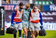 8 November 2020; Tommy O’Brien of Leinster is escorted off the field after receiving an injury during the Guinness PRO14 match between Ospreys and Leinster at Liberty Stadium in Swansea, Wales. Photo by Aled Llywelyn/Sportsfile