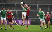 8 November 2020; Barry O'Hagan of Down in action against Stephen McGullion of Fermanagh during the Ulster GAA Football Senior Championship Quarter-Final match between Fermanagh and Down at Brewster Park in Enniskillen, Fermanagh. Photo by Sam Barnes/Sportsfile