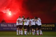 9 November 2020; Dundalk players huddle as a flare is let off outside the ground during the SSE Airtricity League Premier Division match between Dundalk and Sligo Rovers at Oriel Park in Dundalk, Louth. Photo by Sam Barnes/Sportsfile
