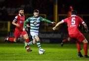 9 November 2020; Jack Byrne of Shamrock Rovers races away from Shelbourne's Gary Deegan on his way to scoring his side's first goal during the SSE Airtricity League Premier Division match between Shelbourne and Shamrock Rovers at Tolka Park in Dublin. Photo by Seb Daly/Sportsfile