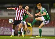 9 November 2020; Conor Clifford of Derry City is tackled by Dylan McGlade and Alec Byrne of Cork City, left,  during the SSE Airtricity League Premier Division match between Cork City and Derry City at Turners Cross in Cork. Photo by Eóin Noonan/Sportsfile