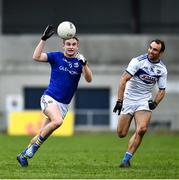 8 November 2020; Dessie Reynolds of Longford is tackled by Gareth Dillon of Laois during the Leinster GAA Football Senior Championship Quarter-Final match between Longford and Laois at Glennon Brothers Pearse Park in Longford. Photo by Ray McManus/Sportsfile