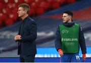 12 November 2020; Declan Rice of England warms up behind Republic of Ireland manager Stephen Kenny during the International Friendly match between England and Republic of Ireland at Wembley Stadium in London, England. Photo by Stephen McCarthy/Sportsfile