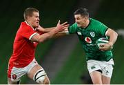 13 November 2020; Jonathan Sexton of Ireland is tackled by Shane Lewis-Hughes of Wales during the Autumn Nations Cup match between Ireland and Wales at Aviva Stadium in Dublin. Photo by Ramsey Cardy/Sportsfile