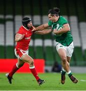 13 November 2020; James Lowe of Ireland is tackled by Leigh Halfpenny of Wales during the Autumn Nations Cup match between Ireland and Wales at Aviva Stadium in Dublin. Photo by Ramsey Cardy/Sportsfile