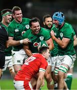 13 November 2020; James Lowe of Ireland celebrates with team-mates Chris Farrell, left, and Will Connors after scoring their side's second try during the Autumn Nations Cup match between Ireland and Wales at Aviva Stadium in Dublin. Photo by David Fitzgerald/Sportsfile