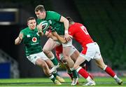 13 November 2020; Chris Farrell of Ireland is tackled by Owen Watkin of Wales during the Autumn Nations Cup match between Ireland and Wales at Aviva Stadium in Dublin. Photo by Ramsey Cardy/Sportsfile