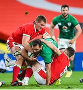 13 November 2020; Jamison Gibson-Park of Ireland is tackled by Shane Lewis-Hughes, left, and Gareth Davies of Wales during the Autumn Nations Cup match between Ireland and Wales at Aviva Stadium in Dublin. Photo by Ramsey Cardy/Sportsfile