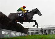 14 November 2020; Sizing Pottsie, with Paddy Kennedy up, jumps the last on their way to finishing second in the Mongey Communications Novice Steeplechase at Punchestown Racecourse in Kildare. Photo by Seb Daly/Sportsfile