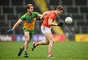 14 November 2020; Oisin O'Neill of Armagh in action against Stephen McMenamin of Donegal during the Ulster GAA Football Senior Championship Semi-Final match between Donegal and Armagh at Kingspan Breffni in Cavan. Photo by David Fitzgerald/Sportsfile
