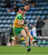 14 November 2020; Michael Langan of Donegal in action against Stephen Sheridan of Armagh during the Ulster GAA Football Senior Championship Semi-Final match between Donegal and Armagh at Kingspan Breffni in Cavan. Photo by Ramsey Cardy/Sportsfile
