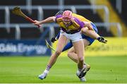 14 November 2020; Paudie Foley of Wexford in action against Colin Guilfoyle of Clare during the GAA Hurling All-Ireland Senior Championship Qualifier Round 2 match between Wexford and Clare at MW Hire O'Moore Park in Portlaoise, Laois. Photo by Matt Browne/Sportsfile