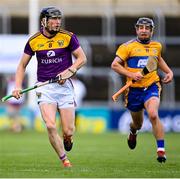 14 November 2020; Diarmuid O'Keeffe of Wexford gets past David Reidy of Clare during the GAA Hurling All-Ireland Senior Championship Qualifier Round 2 match between Wexford and Clare at MW Hire O'Moore Park in Portlaoise, Laois. Photo by Piaras Ó Mídheach/Sportsfile