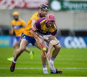 14 November 2020; Paudie Foley of Wexford in action against Cathal Malone of Clare during the GAA Hurling All-Ireland Senior Championship Qualifier Round 2 match between Wexford and Clare at MW Hire O'Moore Park in Portlaoise, Laois. Photo by Matt Browne/Sportsfile