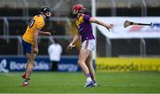 14 November 2020; Paudie Foley of Wexford throws away the hurl of Cathal Malone of Clare after they tussled off the ball during the GAA Hurling All-Ireland Senior Championship Qualifier Round 2 match between Wexford and Clare at MW Hire O'Moore Park in Portlaoise, Laois. Photo by Piaras Ó Mídheach/Sportsfile