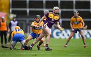 14 November 2020; Liam Ryan of Wexford in action against David Reidy of Clare during the GAA Hurling All-Ireland Senior Championship Qualifier Round 2 match between Wexford and Clare at MW Hire O'Moore Park in Portlaoise, Laois. Photo by Piaras Ó Mídheach/Sportsfile