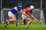 14 November 2020; Tim O'Mahony of Cork is tackled by Jason Forde of Tipperary during the GAA Hurling All-Ireland Senior Championship Qualifier Round 2 match between Cork and Tipperary at LIT Gaelic Grounds in Limerick. Photo by Brendan Moran/Sportsfile