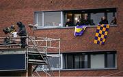14 November 2020; Wexford supporters look on from an apartment near the pitch before the GAA  during the GAA Hurling All-Ireland Senior Championship Qualifier Round 2 match between Wexford and Clare at MW Hire O'Moore Park in Portlaoise, Laois. Photo by Piaras Ó Mídheach/Sportsfile