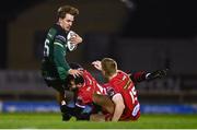 14 November 2020; John Porch of Connacht is tackled by Ryan Conbeer and Johnny McNicholl, right, of Scarlets during the Guinness PRO14 match between Connacht and Scarlets at Sportsground in Galway. Photo by David Fitzgerald/Sportsfile