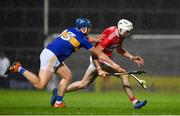 14 November 2020; Tim O'Mahony of Cork is tackled by Jason Forde of Tipperary during the GAA Hurling All-Ireland Senior Championship Qualifier Round 2 match between Cork and Tipperary at LIT Gaelic Grounds in Limerick. Photo by Brendan Moran/Sportsfile