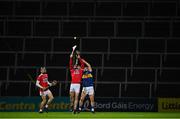 14 November 2020; Seán O'Donoghue of Cork and Willie Connors of Tipperary compete for a dropping ball in front of empty terraces during the GAA Hurling All-Ireland Senior Championship Qualifier Round 2 match between Cork and Tipperary at LIT Gaelic Grounds in Limerick. Photo by Brendan Moran/Sportsfile