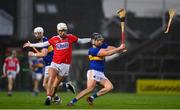 14 November 2020; Dan McCormack of Tipperary is tackled by Luke Meade of Cork during the GAA Hurling All-Ireland Senior Championship Qualifier Round 2 match between Cork and Tipperary at LIT Gaelic Grounds in Limerick. Photo by Brendan Moran/Sportsfile