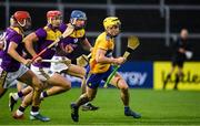 14 November 2020; Rory Hayes of Clare in action against Paul Morris, Lee Chin and Shane Reck of Wexford during the GAA Hurling All-Ireland Senior Championship Qualifier Round 2 match between Wexford and Clare at MW Hire O'Moore Park in Portlaoise, Laois. Photo by Matt Browne/Sportsfile