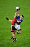 15 November 2020; Oisín Kiernan of Cavan in action against James Guinness of Down during the Ulster GAA Football Senior Championship Semi-Final match between Cavan and Down at Athletic Grounds in Armagh. Photo by Daire Brennan/Sportsfile