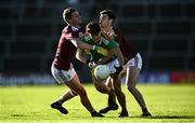 15 November 2020; Tommy Conroy of Mayo in action against Gary O'Donnell, left, and Sean Mulkerry of Galway during the Connacht GAA Football Senior Championship Final match between Galway and Mayo at Pearse Stadium in Galway. Photo by David Fitzgerald/Sportsfile