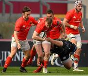 15 November 2020; Rory Scannell of Munster is tackled by Gareth Thomas of Ospreys during the Guinness PRO14 match between Munster and Ospreys at Thomond Park in Limerick. Photo by Matt Browne/Sportsfile