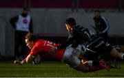 15 November 2020; Mike Haley of Munster scores the second Munster try despite the tackle of Luke Morgan of  Ospreys during the Guinness PRO14 match between Munster and Ospreys at Thomond Park in Limerick. Photo by Matt Browne/Sportsfile
