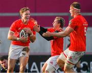 15 November 2020; Mike Haley of Munster celebrates with team-mates Craig Casey and Gavin Coombes after scoring the second Munster try against the Ospreys during the Guinness PRO14 match between Munster and Ospreys at Thomond Park in Limerick. Photo by Matt Browne/Sportsfile