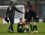 15 November 2020; Lee O’Connor of Republic of Ireland is helped up by team-mate Connor Ronan following the UEFA European U21 Championship Qualifier match between Republic of Ireland and Iceland at Tallaght Stadium in Dublin.  Photo by Harry Murphy/Sportsfile