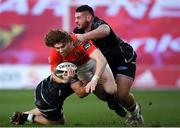 15 November 2020; Ben Healy of Munster is tackled by Ifan Phillips and Gareth Thomas of Ospreys during the Guinness PRO14 match between Munster and Ospreys at Thomond Park in Limerick. Photo by Matt Browne/Sportsfile